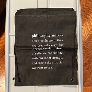 Philosophy Black Drawstring Backpack with White Text